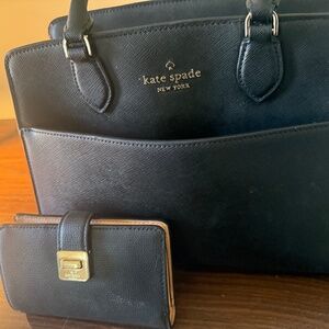 Kate spade leather purse and wallet set.